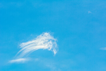 Cloud in the blue sky of a sunny day