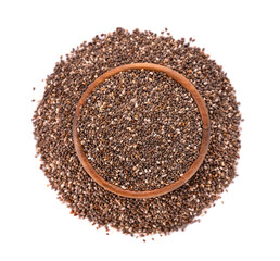 Chia seeds in wooden bowl, isolated on white background. Healthy superfood. Closeup macro of organic chia seeds. Top view.
