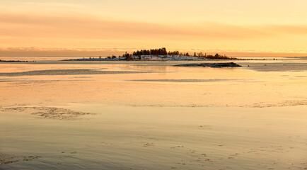 Obraz premium Coast Landscape with small island at Sunset