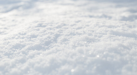 Snow texture. Top view of the white snow. Background with copy space. Winter time