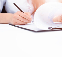 business woman signs documents. background with copy space