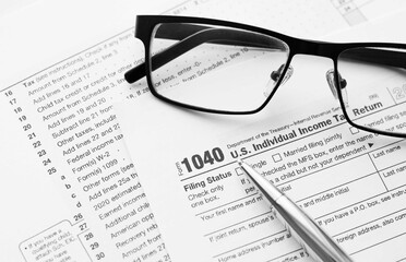 Filling the 1040 Tax Form. Standard US Income Tax Return form.