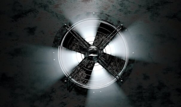 A huge old, rusty fan in the ventilation system rotates slowly and rays of light pass through it