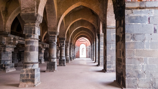 Malda, West Bengal, India - January 2018: The arches in the arcaded corridors and interiors of the ancient Adina Masjid mosque in the village of Pandua.