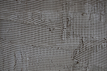 gray concrete wall covering striped texture background image close up