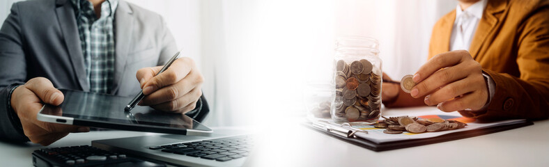 Healthcare costs and fees concept.Hand of smart doctor used a calculator for medical costs in modern hospital