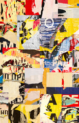 Collage of many numbers and letters ripped torn advertisement street posters grunge creased crumpled paper texture background placard backdrop surface
