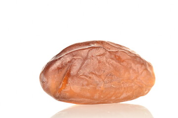 One dried organic date, close-up, isolated on white.