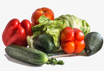 various vegetables, avocado with cucumber and parsley, bell pepper and tomato