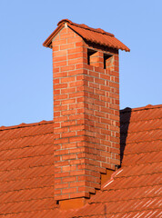  house from a red brick with a pipe