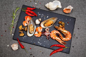 plate of crustacean seafood with mussels, hrimps, oysters