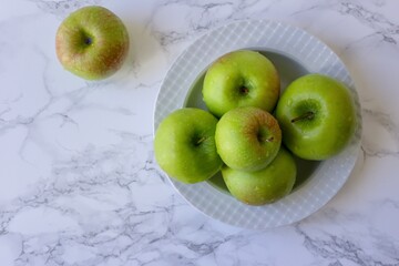 green apples in a bowl