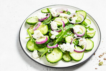 Rucola cucumber salad sesame seeds. Space for text.
