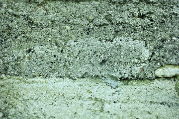 wall texture background with black stones