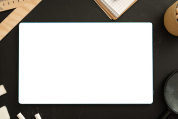 Online school class cover - celection of stationery on black board, top view