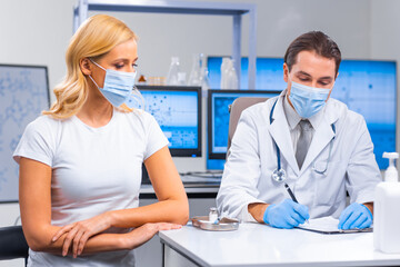 Obraz premium Professional doctor makes a coronavirus vaccine using a syringe and hypodermic needle. Professional medical worker and patient at the hospital office. Vaccination and safety.