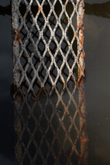 rusty metal grid