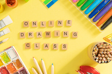 Online drawing class cover concept - supplies on bright background, top view