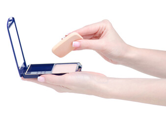 Make up face powder in hand on white background isolation