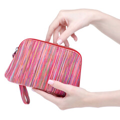 Pink cosmetic bag beauty in hand on white background isolation