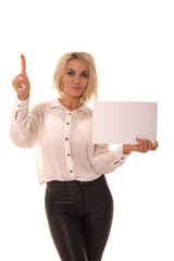 Girl asks for attention with a white sign in hand.