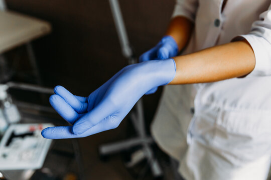 Personal protective equipment Vinyl disposable gloves for the spread of viruses and protection against infections. The trend of protection against coronavirus is COVID-19.