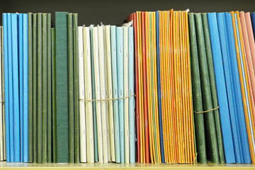 documents on a bookcase © flafabri