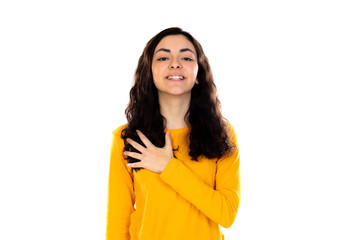 Adorable teenage girl with yellow sweater