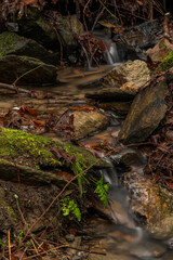 Small creek near Malse river with Doudlebsky waterfall in cold winter color day