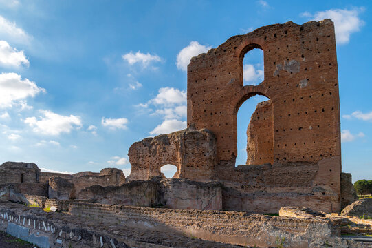 A suggestive image of the Imperial Villa of the Quintili, the baths, on a beautiful day of blue sky the ruins stand out in the blue. Rome Appia Antica