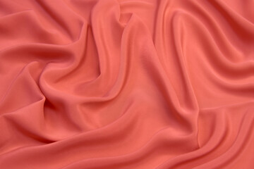 Close-up texture of natural red or pink fabric or cloth in same color. Fabric texture of natural...