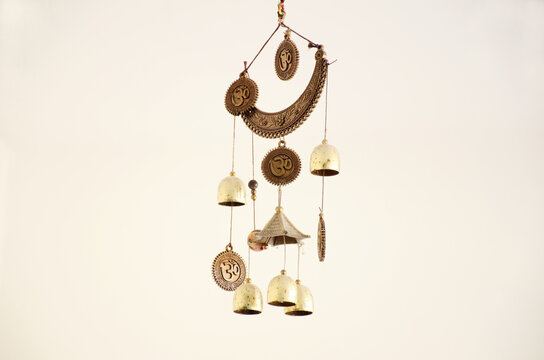 Isolated Shot Of Hanging Decorative Wind Chime With Bells On White Background