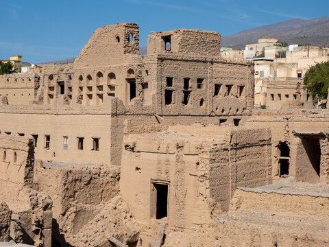 Exterior view of a mostly abandoned mud construction houses in Bait Al Safah, Al Hamra, Sultanate of Oman