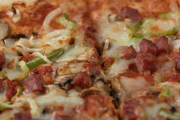 Cooked pizza dough with mixed chopped and minced ingredients