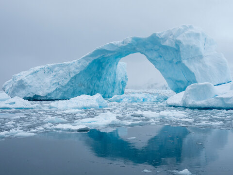 A huge arch formed in a tilted iceberg in Cierva Cove