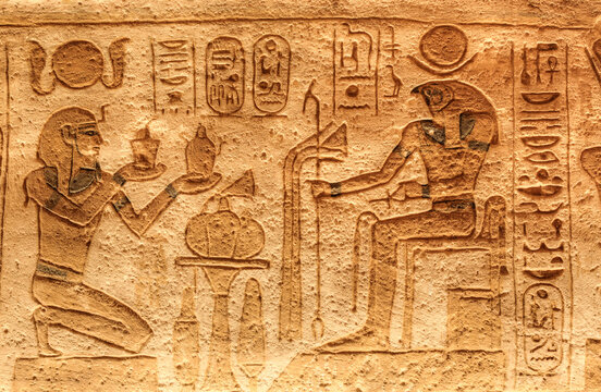 Ramses II on left with God Horus seated on right, Sunken Relief, Lateral Chamber, Ramses II Temple, Abu Simbel, Nubia, Egypt
