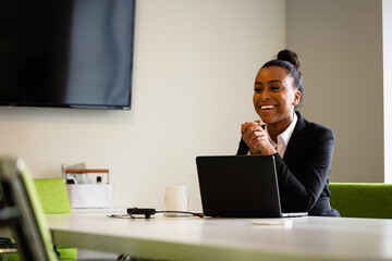 Young businesswoman sales consultant chatting in modern business office