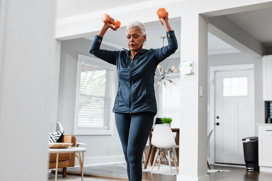 Senior Black Woman Exercising At Home, Active Lifestyle Fitness