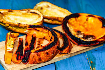 baked pumpkin on a wooden table