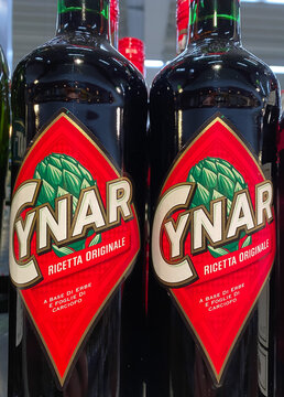 Viersen, Germany - February 9. 2021: Closeup of bottles italian artichoke liqueur Cynar in shelf of german supermarket