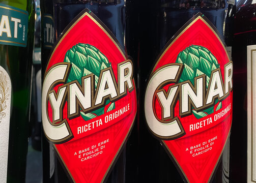 Viersen, Germany - February 9. 2021: Closeup of bottles italian artichoke liqueur Cynar in shelf of german supermarket