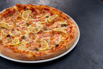 fresh pizza on the white plate