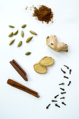 Creative layout made of masala tea on white background. View from above. Indian drink.
