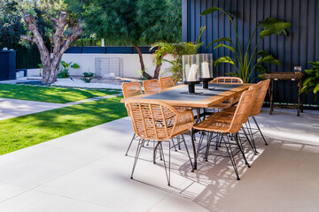 Chairs and table arranged in patio