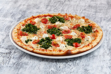 fresh pizza on the white plate