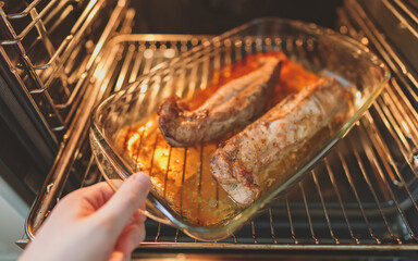 Homemade baked pork tenderloin in the oven.