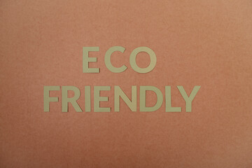 Eco Friendly cardboard letters on a craft paper