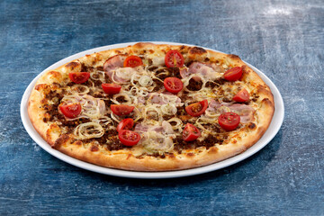 fresh pizza on the white plate