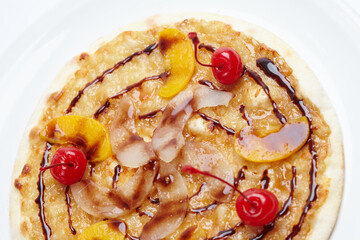 sweet pizza with peach and cherries