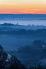 Yssandon (Corrèze, France) - Lever de soleil hivernal depuis le vieux bourg © PhilippeGraillePhoto